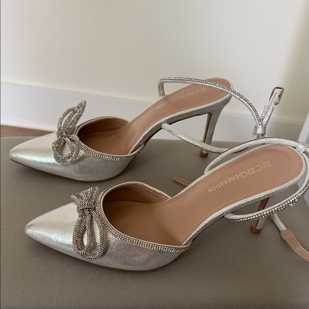 BCBGeneration Silver Heels with Embellished Bow
